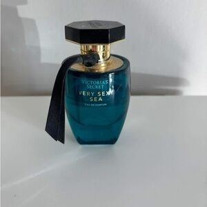 Victoria's Secret Teal Fragrance Bottle with Black Cap